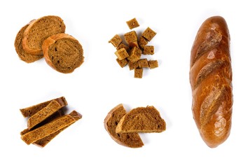 Set of loaf of dark bread, whole and sliced. Close up. Top view. Isolated on white background
