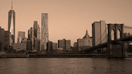 sepia view of New York downtown, Brooklyn Bridge and Manhattan, New York City