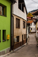 Fototapeta na wymiar Narrow street in the historic district of Sarajevo in autumn. Bosnia and Herzegovina