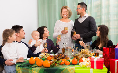 mature pair celebrating jubilee with  family