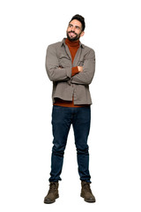 Fototapeta premium Full-length shot of Handsome man with beard looking up while smiling on isolated white background