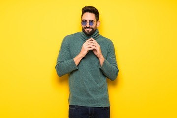 Handsome man with sunglasses scheming something