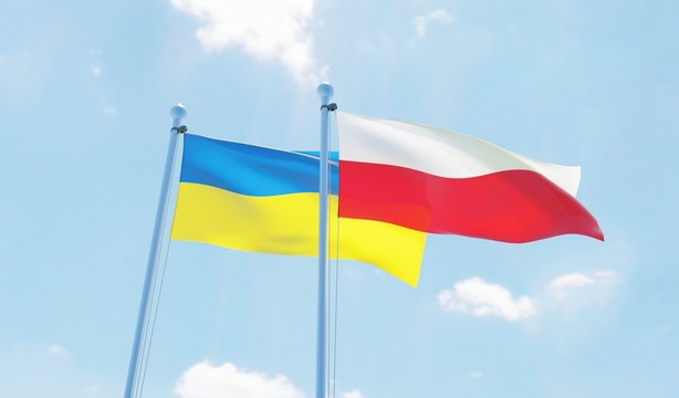 Poland and Ukraine, two flags waving against blue sky. 3d image