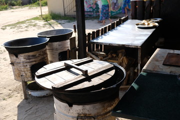 summer on the sea coast cauldrons for cooking pilaf and food sea stret 2017 2018 2019 2020