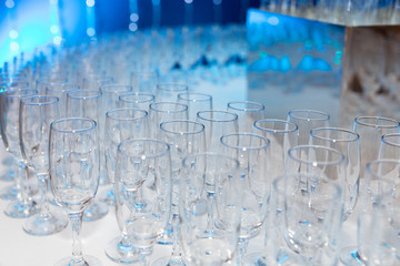 Close-up of empty glasses of champagne or wine are on the table at the ceremony