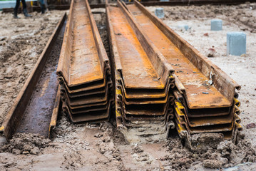 Construction site. Retaining wall steel sheet pile materials stock on construction site