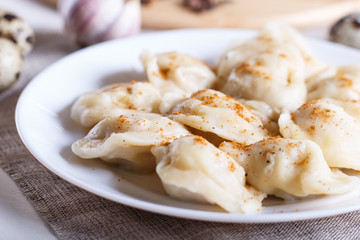 dumplings on a white plate, selective focus.