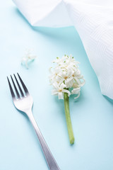 white flower and fork