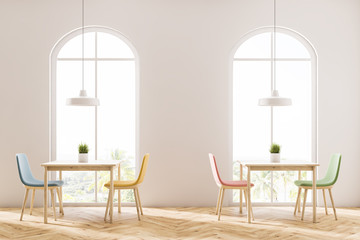 Tables in arched cafe interior