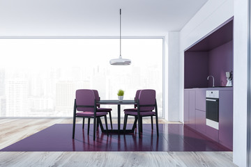 Side view of purple kitchen with table