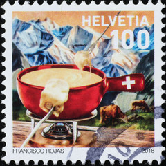Swiss cheese fondue on postage stamp