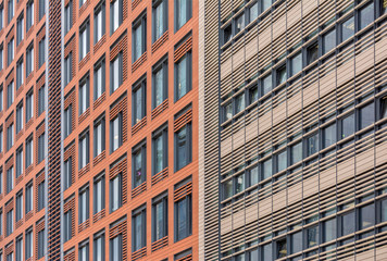 Fototapeta na wymiar Office building made of metal panels with large Windows.