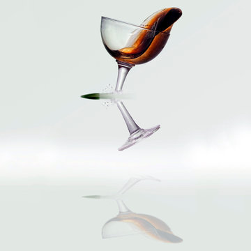 Bullet breaking the stem of a wine glass