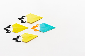 Paper Airplanes lead by blue