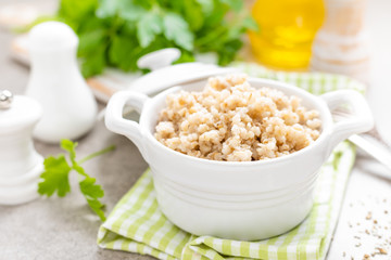 Barley porridge on white background