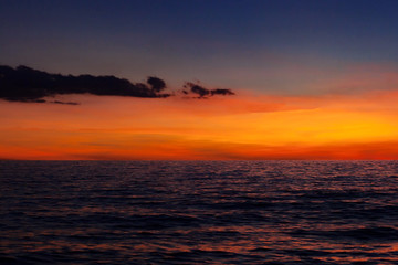 sunset on the sea with clouds