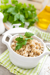 Barley porridge on white background