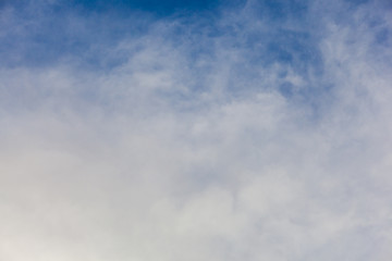 white clouds in the blue sky, clear weather, Sunny day. for the background, design, copy space