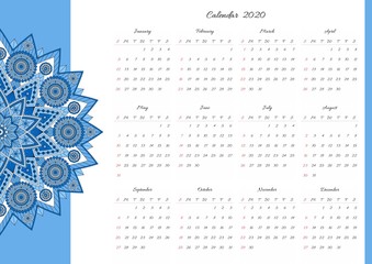 Fototapeta na wymiar Calendar for 2020 year with oriental pattern. Mandala in blue colors. Week starts on sunday.