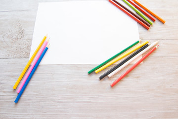 color pencils and paper background