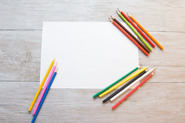 color pencils and paper background