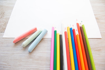 color pencils and paper background