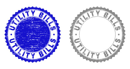 Obraz premium Grunge UTILITY BILLS stamp seals isolated on a white background. Rosette seals with grunge texture in blue and grey colors. Vector rubber overlay of UTILITY BILLS label inside round rosette.