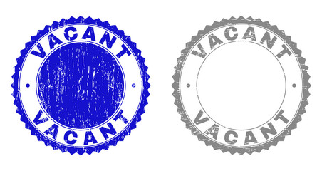 Grunge VACANT watermarks isolated on a white background. Rosette seals with grunge texture in blue and gray colors. Vector rubber stamp imprint of VACANT text inside round rosette.