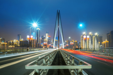 Fototapeta na wymiar Expressway on Yangtze River Bridge and Modern City Scenery in Chongqing, China