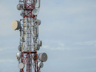 Kuala Lumpur, Malaysia - February 13, 2019 : Telecommunications or Communication transmitter tower with blue sky. Selective focus and crop fragment