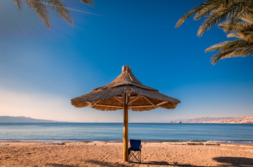 Morning on a sandy beach of Eilat - famous tourist resort in Israel