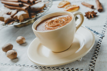 Cup of hot chocolate and homemade ginger cookies