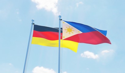 Philippines and Germany, two flags waving against blue sky. 3d image
