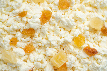 Cottage cheese with raisins and tsukati, close-up, macro