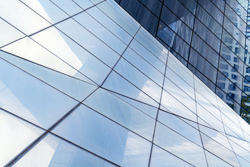 Fototapeta na wymiar Close-up of glass windows of skyscrapers
