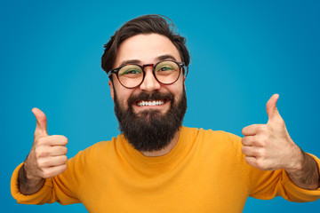 Bearded man showing thumbs up