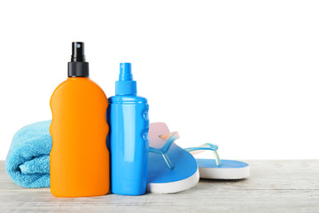 Composition with sun protection products on white background. Body care