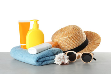 Composition with sun protection products on white background. Body care