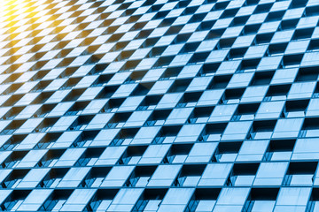 Fototapeta premium Close-up of glass windows of skyscrapers