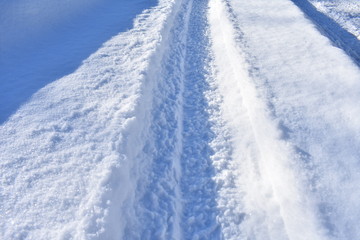 car tracks in the snow