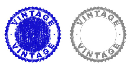 Grunge VINTAGE stamp seals isolated on a white background. Rosette seals with grunge texture in blue and grey colors. Vector rubber stamp imprint of VINTAGE caption inside round rosette.