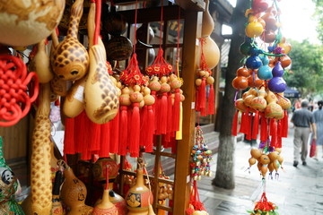 Rows of red and blue traditional Chinese souvenirs