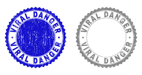 Grunge VIRAL DANGER stamp seals isolated on a white background. Rosette seals with grunge texture in blue and grey colors. Vector rubber stamp imitation of VIRAL DANGER title inside round rosette.