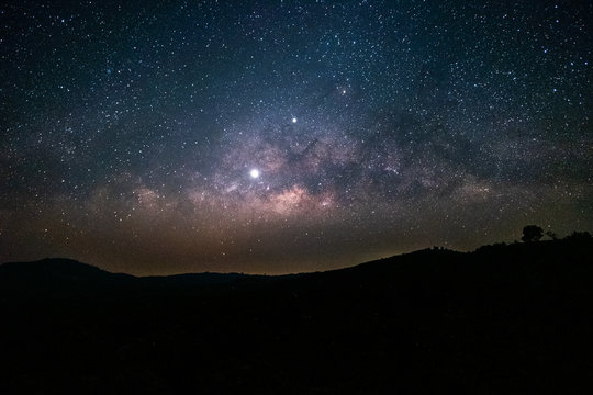 Milkyway galaxy landscape with Jupiter and Venus inline. - Powered by Adobe