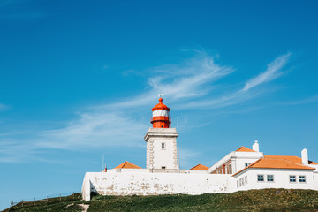 Beautiful view of the lighthouse off the west coast of the Atlantic Ocean at Cape Roca in Portugal.
