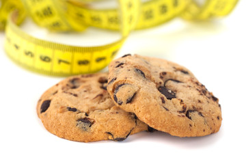 Chocolate Chip Cookie  with Measuring Tape Isolated on White, Diet Concept