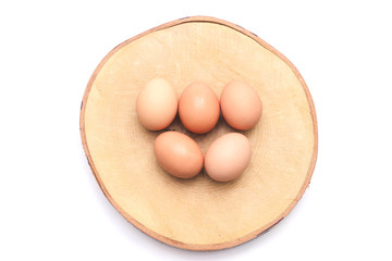 egg in clear plastic tray on white background