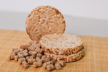 Bran and cereals. Scattered on the table. Healthy food. Slimming diet