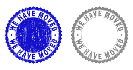 Grunge WE HAVE MOVED stamp seals isolated on a white background. Rosette seals with distress texture in blue and grey colors. Vector rubber overlay of WE HAVE MOVED title inside round rosette.