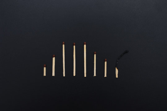 the matches burned and shredded on a black background